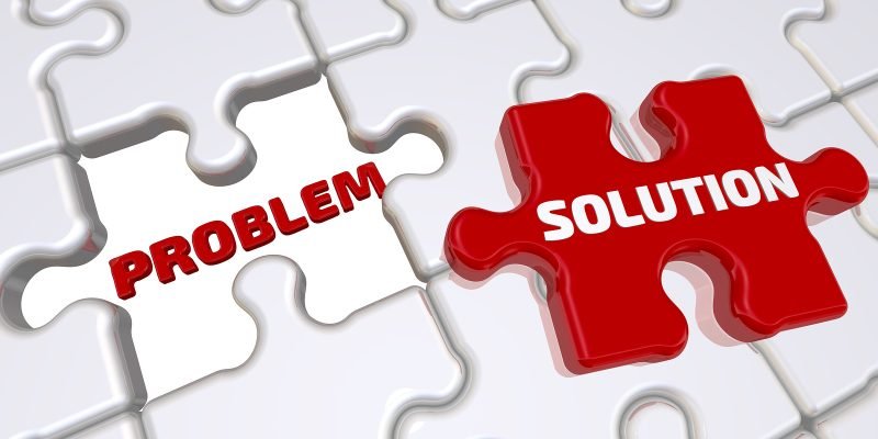 Problem solution concept. The folded white puzzles elements with empty place labeled PROBLEM and one red puzzle with word SOLUTION. 3D Illustration